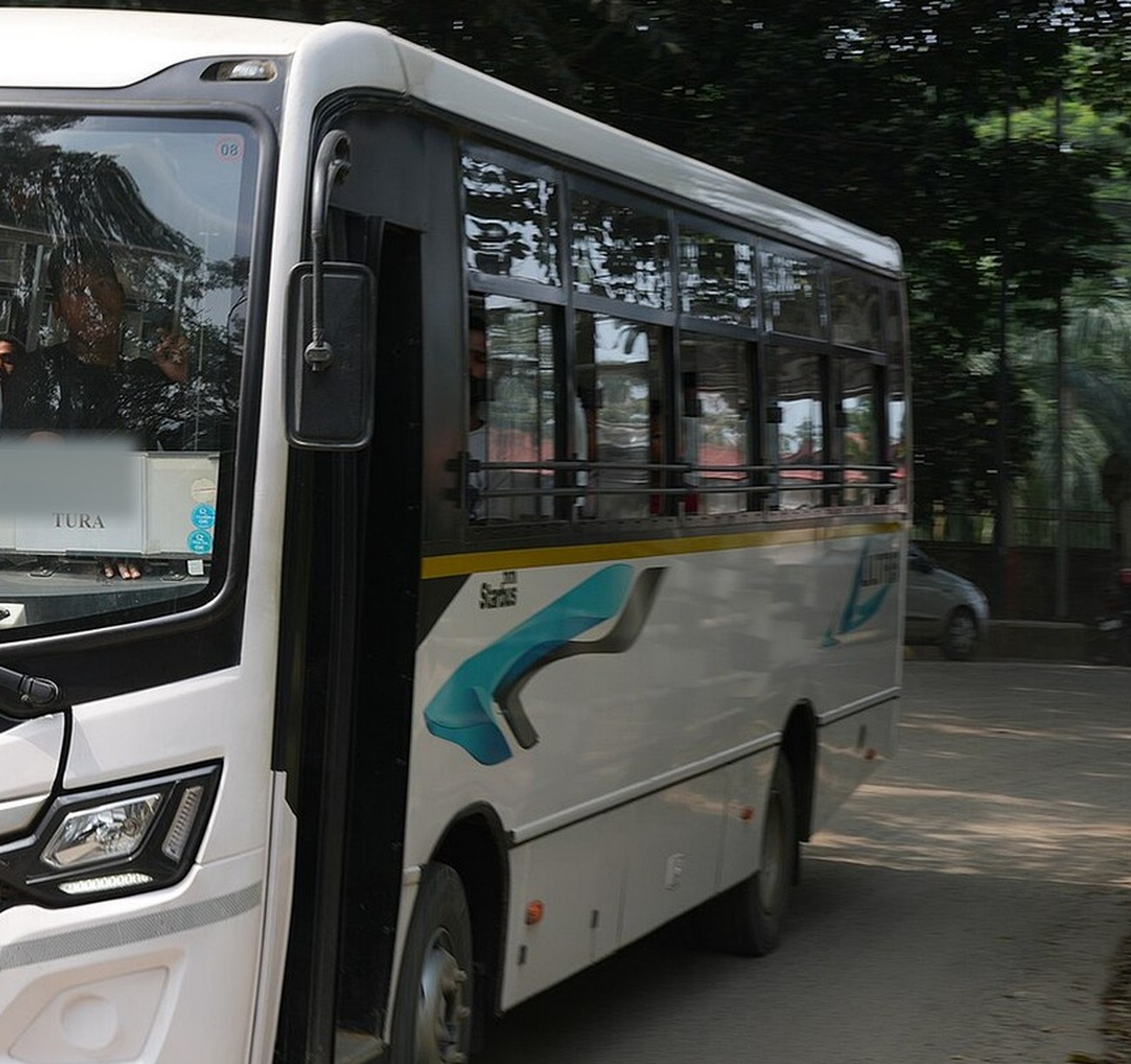 Raahi Vacation 35 seater bus, side view