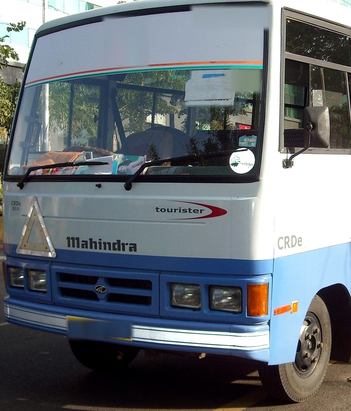 Raahi Vacation mini coach, front three-quarter view